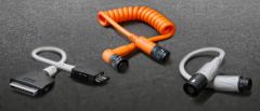 Three different cable assemblies on a grey background.