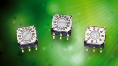 Three rotary coded switches on a green background.